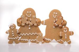 Family of Isolated Ginger Bread People on White Background photo