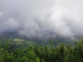 Sky with clouds in the hill photo