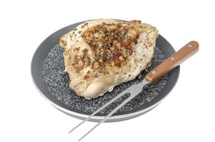 Meat dishes, grilled turkey with seasonings and spices. photo