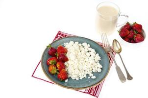 Healthy nutrition. Dairy products, fresh strawberries. Photo