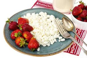Healthy nutrition. Dairy products, fresh strawberries. Photo