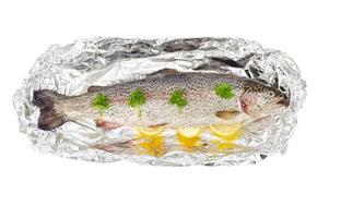 Fresh rainbow trout for baking isolated on white photo