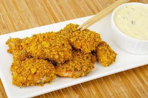 Sliced salmon breaded with sauce. Studio Photo