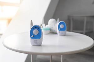 Baby monitor on table in room. Radio nanny photo