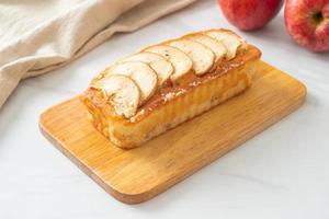 apple loaf crumbled on wood board photo