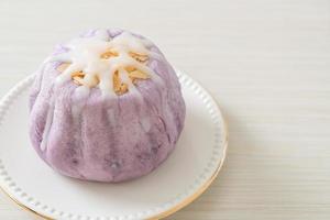 taro bun with white sugar cream and nut photo