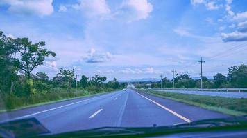 Landscape road paved road Rural Roadside View Mountain View. Road transport road. Car running on the street photo