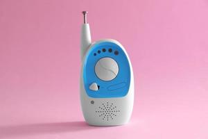 Baby monitor on color background. Radio nanny photo