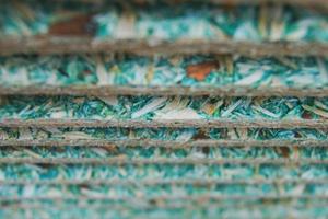 Stack of recycled wood floor panels. photo