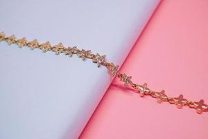 photo of women's long bracelet with star motif and glitter decoration