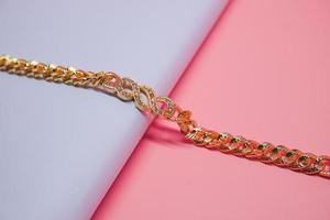 photo of women's gold bracelet with round motifs with sparkling jewelry