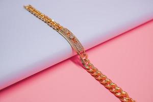 photo of women's square bracelet decorated with diamond gems