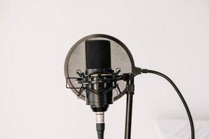 Professional studio microphone on a modern tripod photo