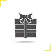 Gift icon. Drop shadow present silhouette symbol. Gift box. Vector isolated illustration