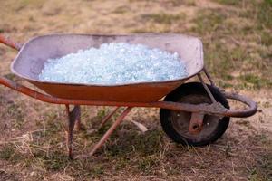 Shattered Glass in a wheel barrow photo