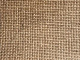 brown burlap hessian fabric background photo