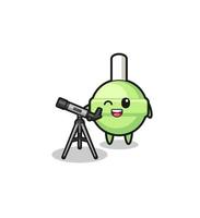 Mascota de astrónomo piruleta con un telescopio moderno. vector