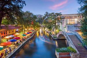 River walk in San Antonio city downtown skyline cityscape of Texas USA