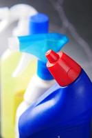 close up of cleaning bottle on table photo