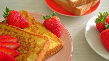 French toast with fresh strawberry on plate video