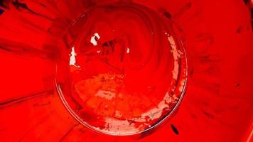 Abstract background of spilled red paint with buckets on a black backdrop. Red paint is pouring on a black background. Use it for an artist or creative concept. paints spilled red colored background photo