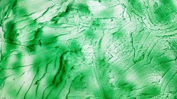 Green sponge texture. Polystyrene foam texture background. old green foam rubber texture as background photo
