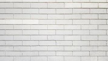 Textura de pared de ladrillo blanco moderno para el fondo. Resumen degradado. Paredes de ladrillo blanco. bloques de piedra. tecnologías de arquitectura horizontal. fondo de pantalla foto