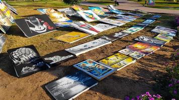 Egypt, Sharm El Sheikh - June 20, 2019. paintings for sale on the street in a park in the Amway Hotel. Flea market and street gallery of art and creativity. photo