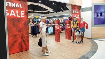 Ukraine, Kiev - September 04, 2019. Sale signs in a shop window in a shopping center on the day of shopping and the international holiday Black Friday, sale and discounts in clothing boutiques photo