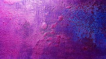 Pink blue texture for background design. Delicate classic texture. Colorful background Colorful wall. Fragment of a stone wall with colorful signs and paint lighting. background with copy space. photo