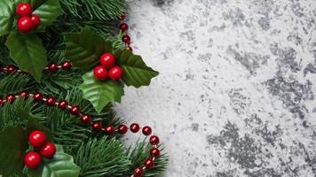 Christmas decorations, pine tree leaves, balls, berries on grunge background, Selective focus christmas concept photo