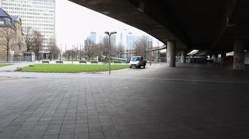 Dusseldorf, Germany - February 20, 2020. The beautiful promenade of Dusseldorf in Altstadt. Lifestyle and tourism concepts. North Rhine. City center, river embankment. Under the Oberkassel bridge photo