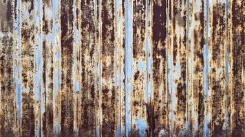 Dark shabby rusty metal texture background. Rusty metal surface with paint photo
