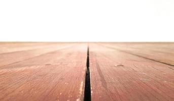 Wooden board empty table in front of a white background. Brown Wood Perspective - Can be used to showcase or assemble your products. Pick up to demonstrate the product. The texture of the old photo