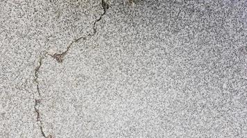 stone texture or background. Coarse cracked stone structure of the face. empty gray stone texture or background photo