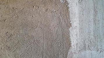 Vintage interior of a gray cement wall. Plaster texture. Grungy gray textured background in a rustic style. Concrete plaster. Pattern Details Empty Blank Space Copy Macro Closeup photo