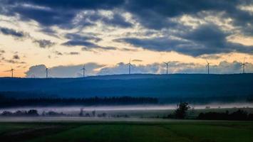 Picturesque view of fields in fog photo