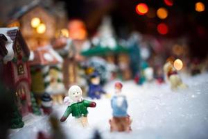 Miniature Christmas Village under Xmas Tree photo