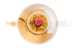 Top view of Tea Flower in a Clear Teapot photo