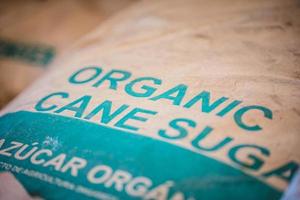 Paper bag of organic cane sugar photo