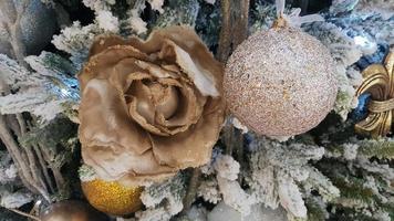 Close-up of a Christmas background. Celebration. Christmas tree with toys and decorative snow for a happy new year. Christmas decorations, New Year's atmosphere. Beautiful modern postcard. photo