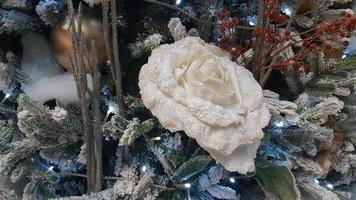 Close-up of a Christmas background. Celebration. Christmas tree with toys and decorative snow for a happy new year. Christmas decorations, New Year's atmosphere. Beautiful modern postcard. photo