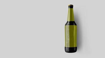 Top up view brown beer bottle with blank yellow template isolated on grey background. beer fiesta concept. photo