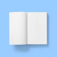 Back to school concept , hard cover blank white book first page open isolated on blue. photo