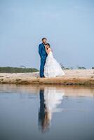 Asian bride and Caucasian groom have romance time and happy together photo