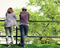 Happy couple resting in a summer garden. photo