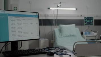 Close up of desk with computer and medical tools video