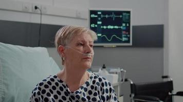 Close up of retired woman with nasal oxygen tube video