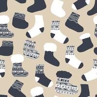 Seamless pattern of knitted socks. Vector illustration for Christmas winter time in blue white beige colors