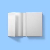 Back to school concept , hard cover blank white open dust jacket partially off isolated on blue. photo